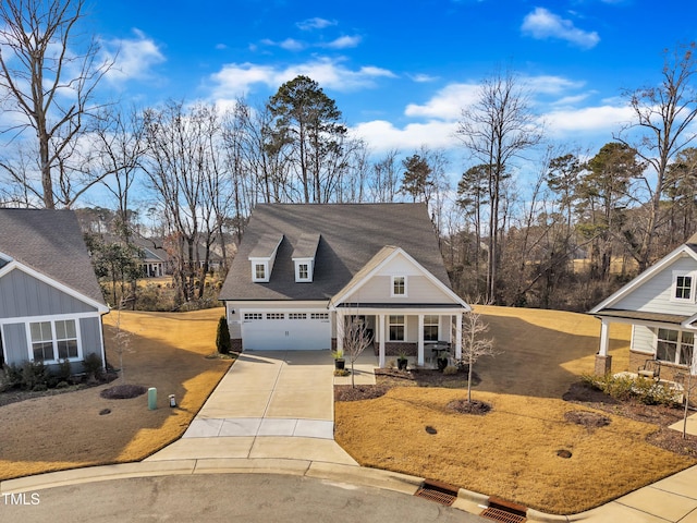 view of front facade featuring a garage and a porch