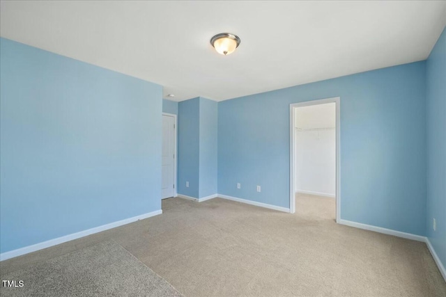 empty room with light colored carpet