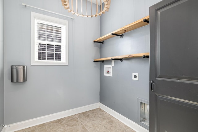 clothes washing area featuring washer hookup and hookup for an electric dryer