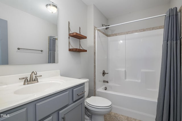 full bathroom with shower / bath combination with curtain, tile patterned floors, vanity, and toilet