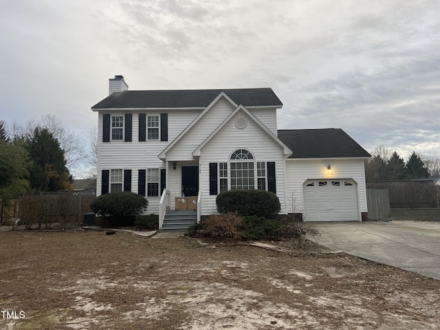 view of front of home with a garage