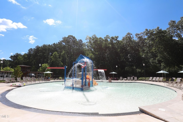 view of pool featuring pool water feature