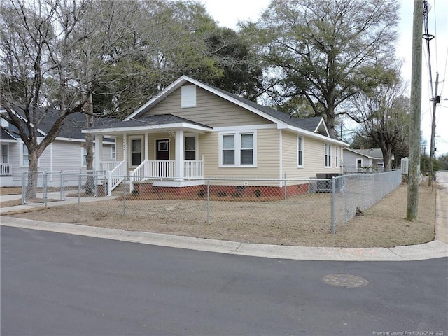 view of front of property featuring covered porch and central air condition unit