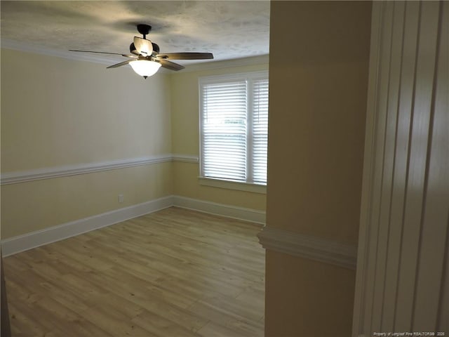 unfurnished room with light hardwood / wood-style floors and ceiling fan