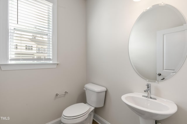 bathroom with toilet and sink