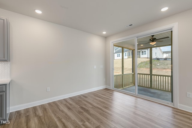 interior space featuring light hardwood / wood-style floors and ceiling fan