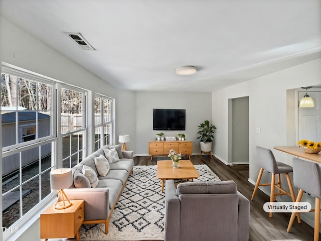 living room with dark wood-type flooring