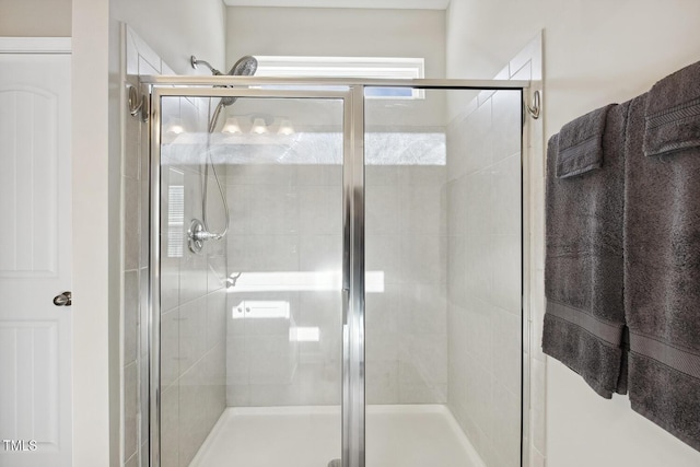 full bath featuring a stall shower