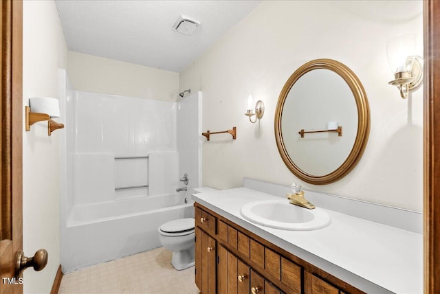 full bathroom featuring bathtub / shower combination, vanity, toilet, and a textured ceiling