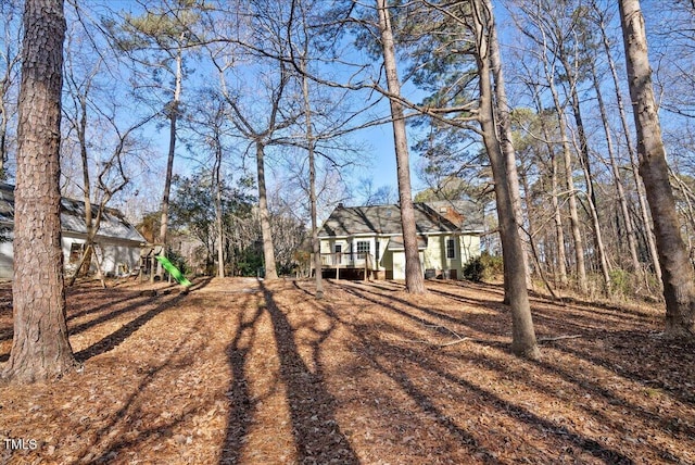 view of yard featuring a deck