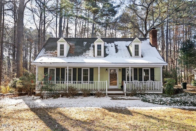 cape cod home with covered porch