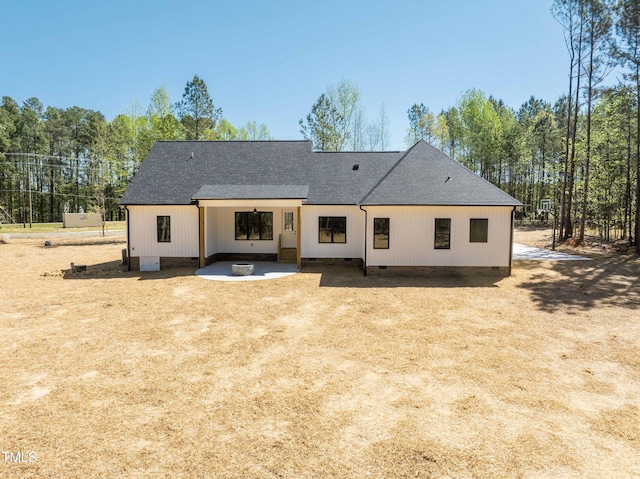 back of house with a patio