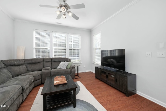 living room with crown molding, hardwood / wood-style flooring, and ceiling fan