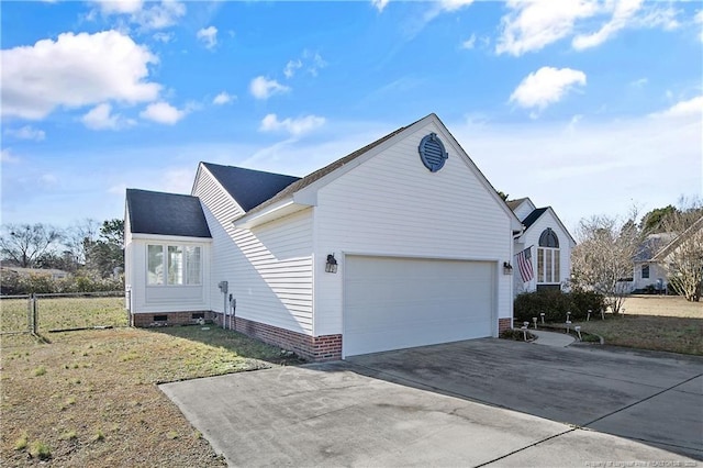 view of property exterior with a garage and a lawn