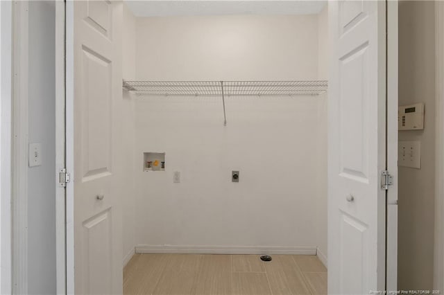 laundry room with electric dryer hookup and hookup for a washing machine