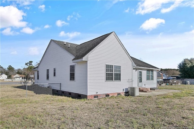 view of property exterior with a lawn