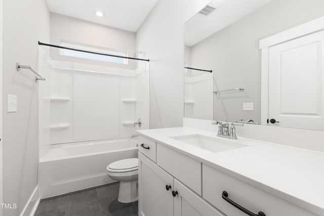 full bathroom with shower / bathing tub combination, vanity, tile patterned floors, and toilet