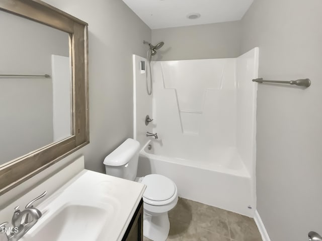 full bathroom featuring shower / tub combination, vanity, toilet, and tile patterned floors