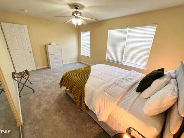 bedroom featuring carpet floors, ceiling fan, and baseboards