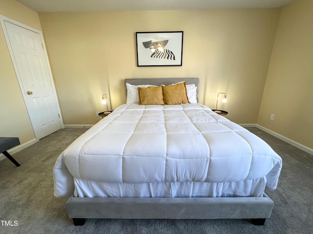 carpeted bedroom with baseboards