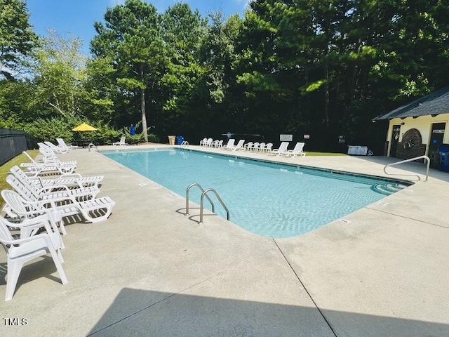 view of pool featuring a patio area