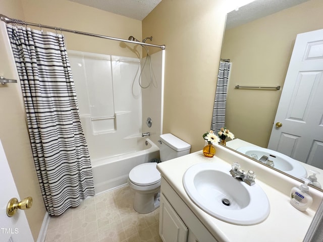 full bath with shower / bath combo with shower curtain, a textured ceiling, toilet, and vanity