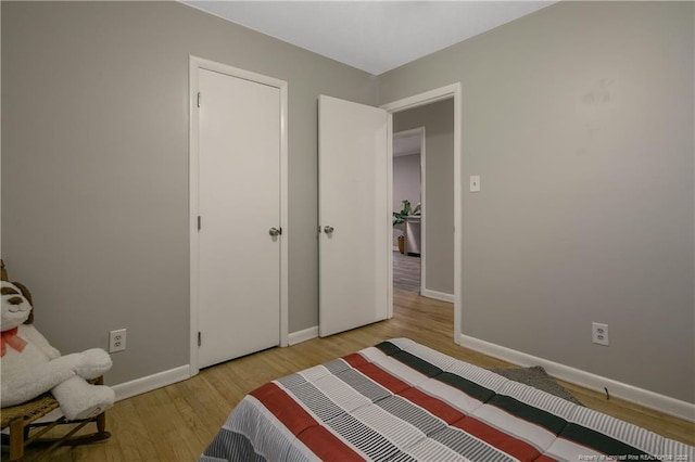 bedroom featuring light hardwood / wood-style flooring