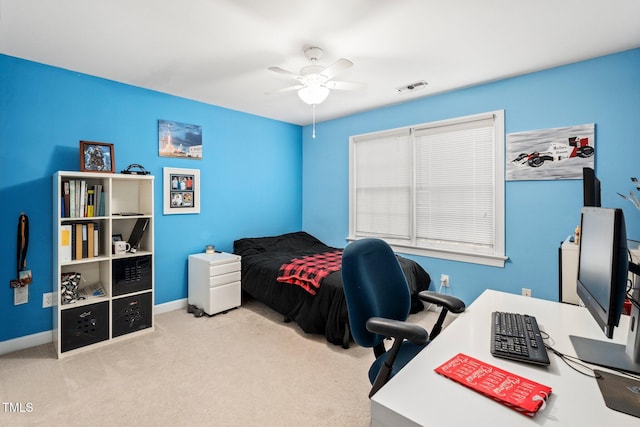 bedroom featuring light carpet and ceiling fan