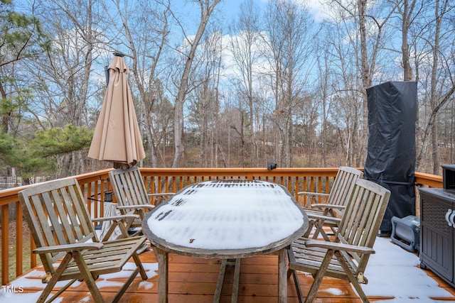 view of snow covered deck