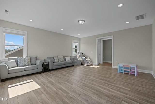 unfurnished living room featuring light hardwood / wood-style flooring