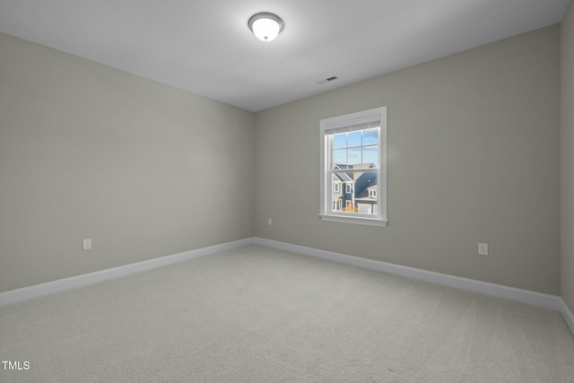 empty room featuring carpet flooring