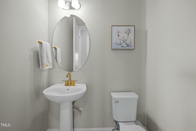 bathroom featuring toilet