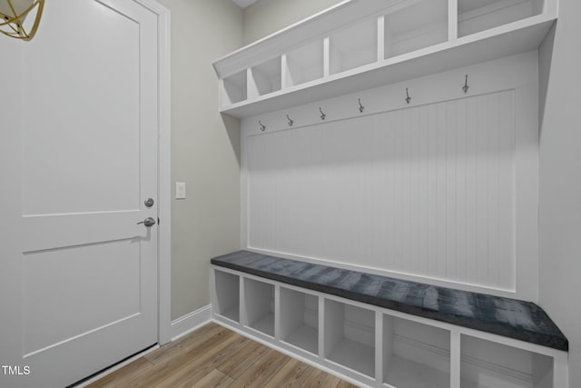 mudroom with hardwood / wood-style flooring