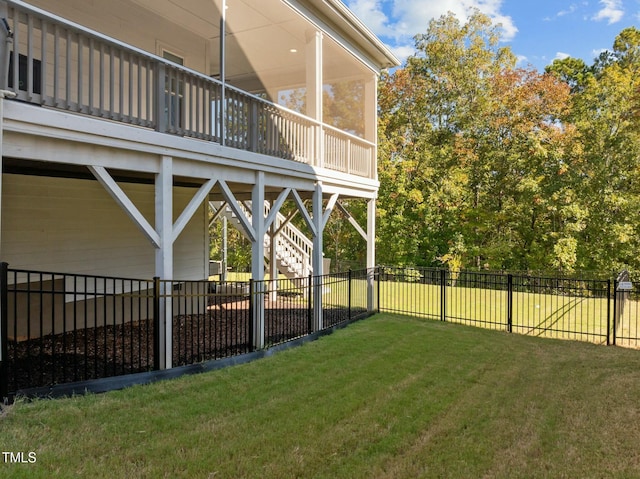 view of yard featuring a sunroom