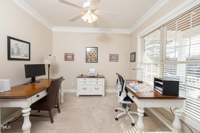 home office featuring crown molding, light carpet, and ceiling fan