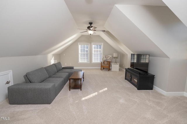 living room featuring lofted ceiling, light carpet, and ceiling fan