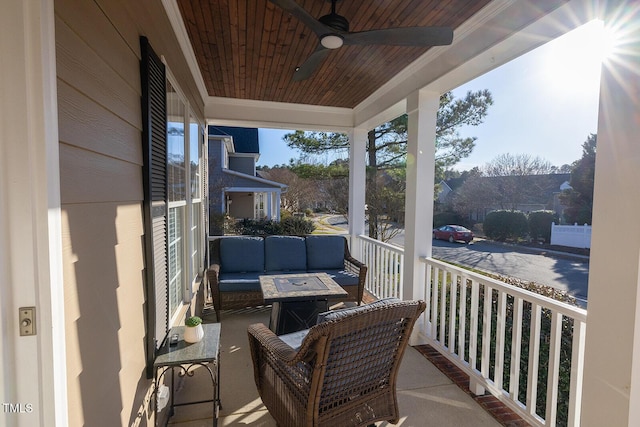 exterior space featuring wooden ceiling and ceiling fan