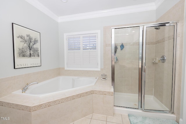 bathroom featuring tile patterned floors, ornamental molding, and separate shower and tub