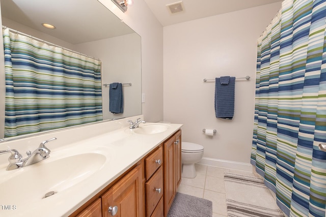 bathroom with vanity, tile patterned floors, toilet, and a shower with shower curtain