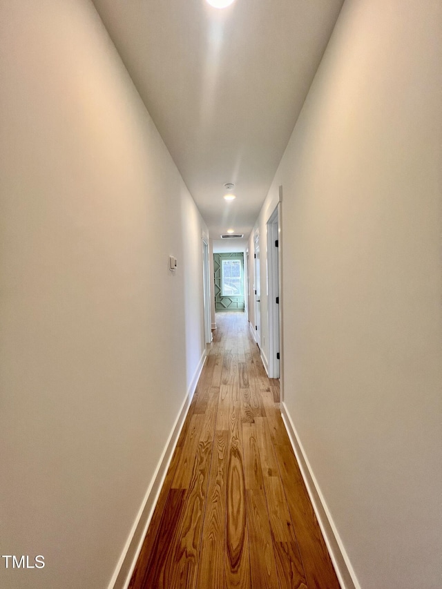 corridor featuring light wood-type flooring