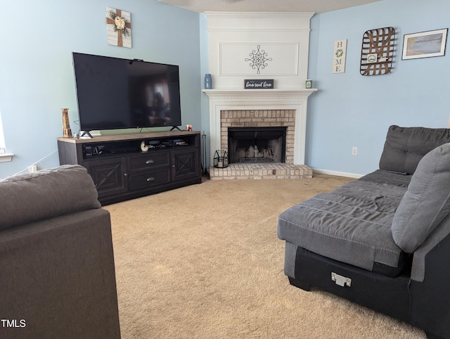 living room with a brick fireplace and light carpet