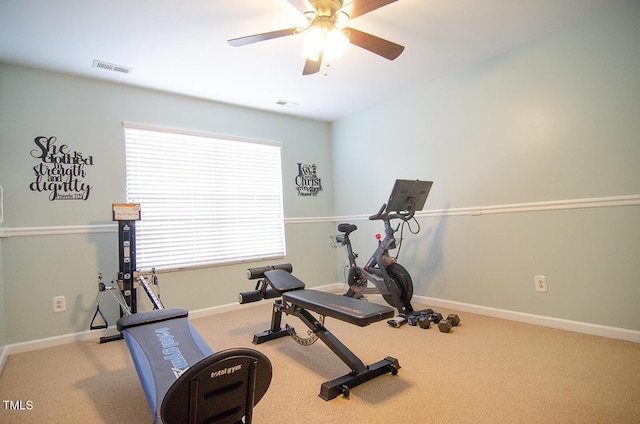 workout room with ceiling fan and carpet floors