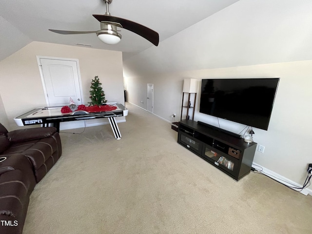 carpeted living room featuring vaulted ceiling and ceiling fan