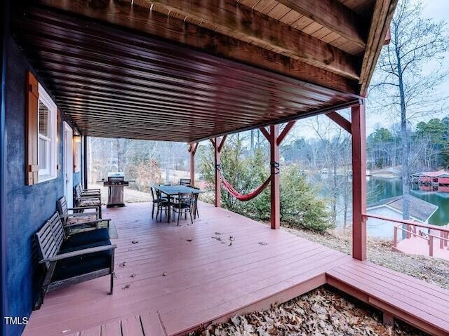 wooden terrace with grilling area