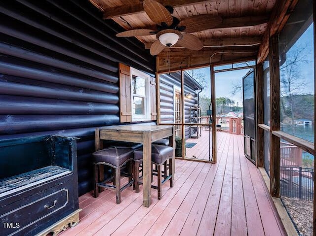 wooden terrace with ceiling fan