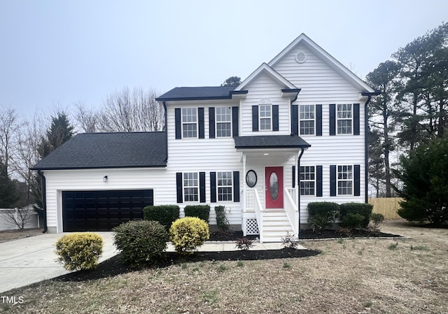 view of front of home with a garage