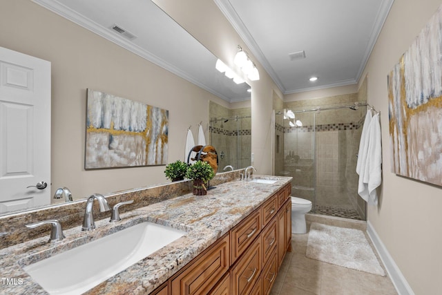 bathroom featuring tile patterned floors, ornamental molding, toilet, and vanity