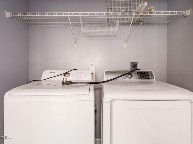 laundry area with washer and dryer