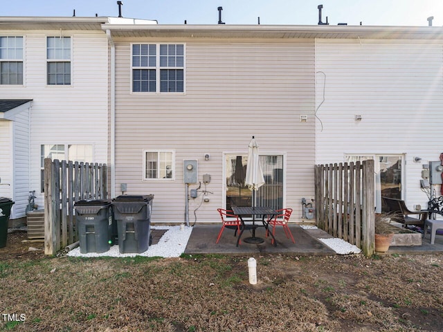 back of property featuring a patio