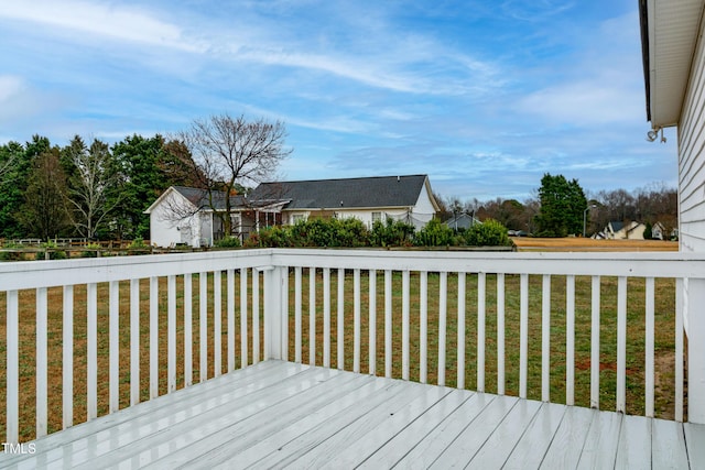 deck featuring a yard